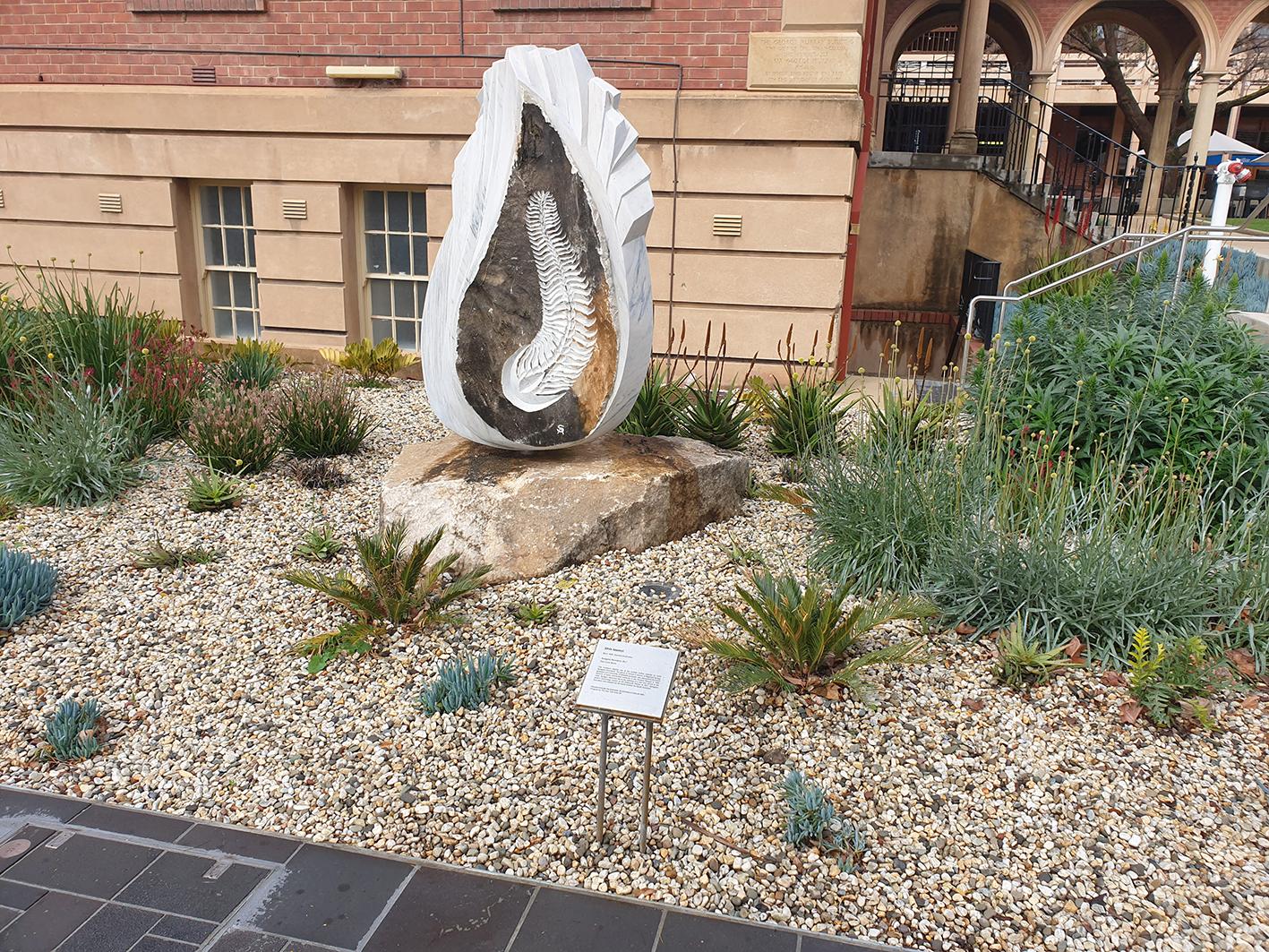 fossil-emblem-sculpture-unveiled-on-campus-newsroom-university-of