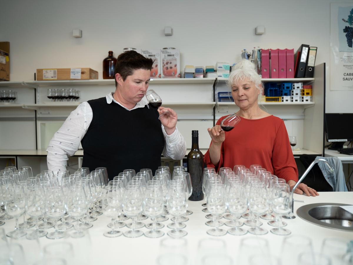 Professor Kerry Wilkinson and Doctor Renata Ristic tasting wine