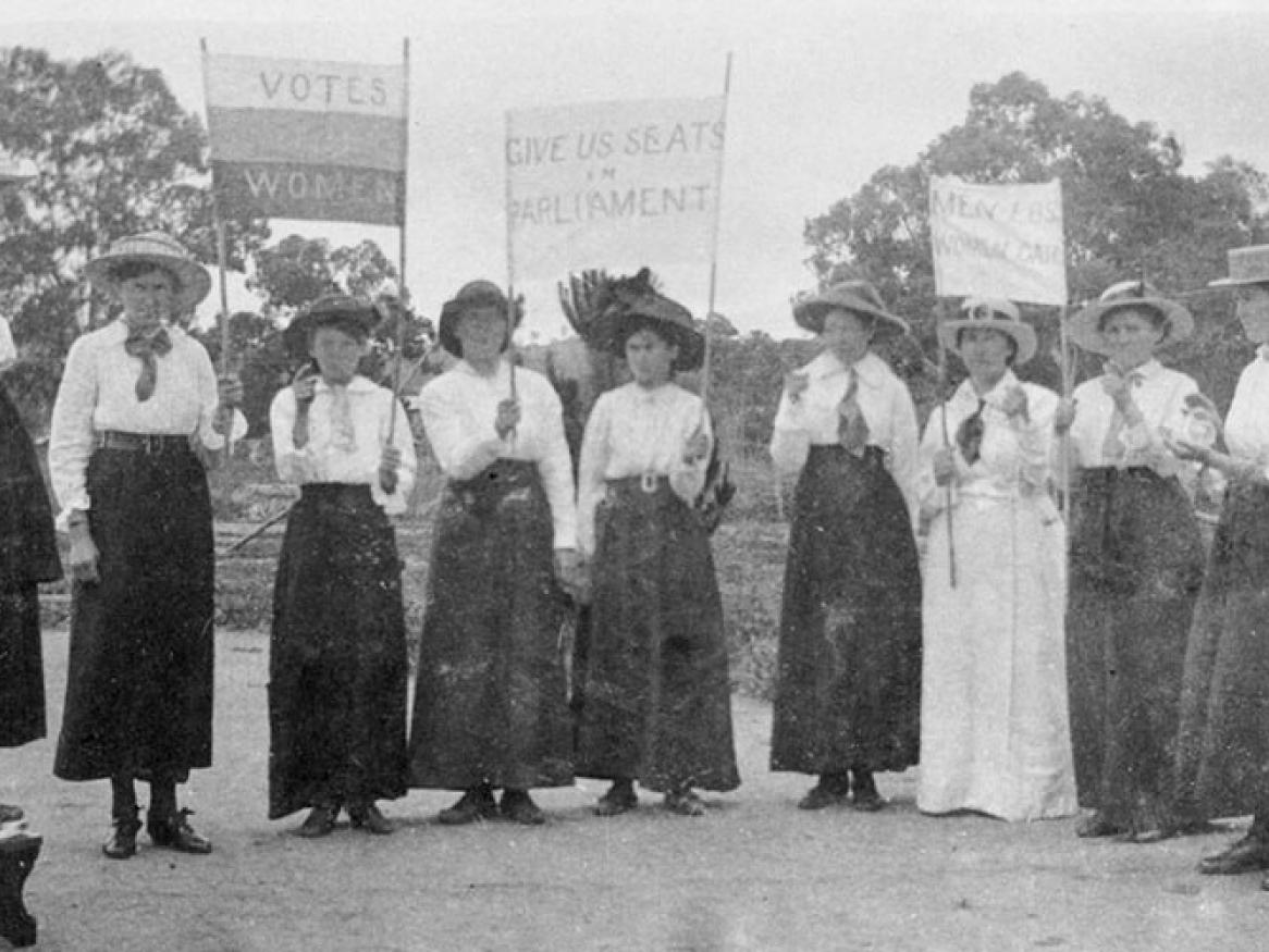 Historical image of women campaigning for suffrage