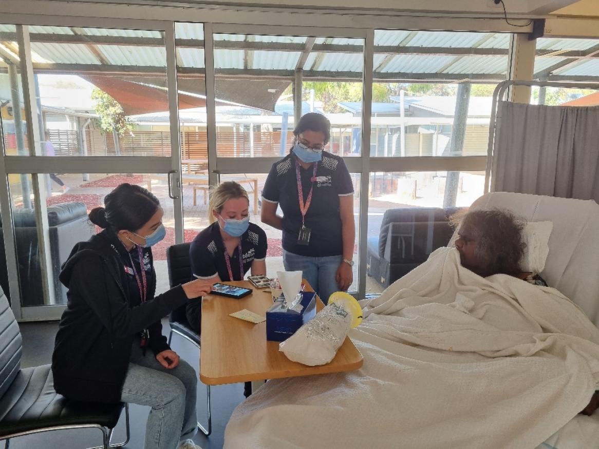 TAFE SA dental hygiene students talk to a resident at Kanggawoldi