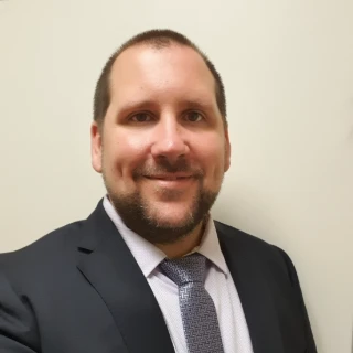 Profile of Mr Adam Childs