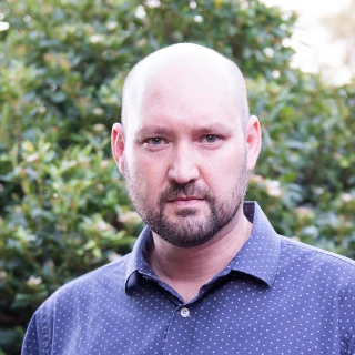 Profile of Mr Anthony Kosturjak
