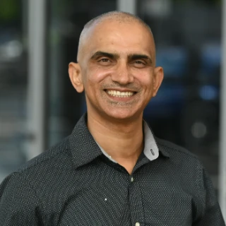 Profile of Dr Arjun Burlakoti