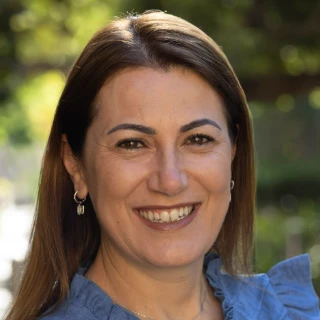 Profile of Ms Carmel Dangelo