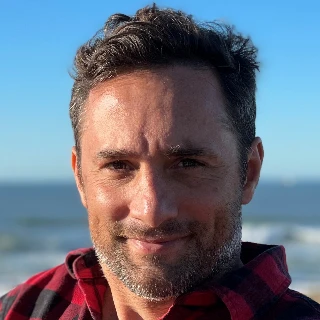 Profile of APrf Charles Caraguel