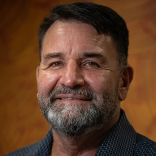 Profile of Dr James Charles