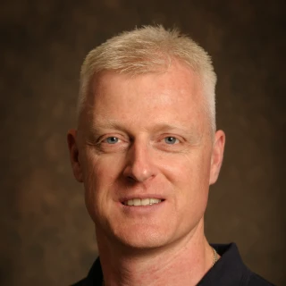 Profile of Dr Rolf Scharfbillig