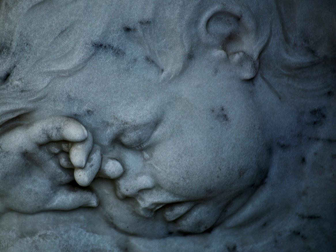 image of a crying statue - links to grief and loss page