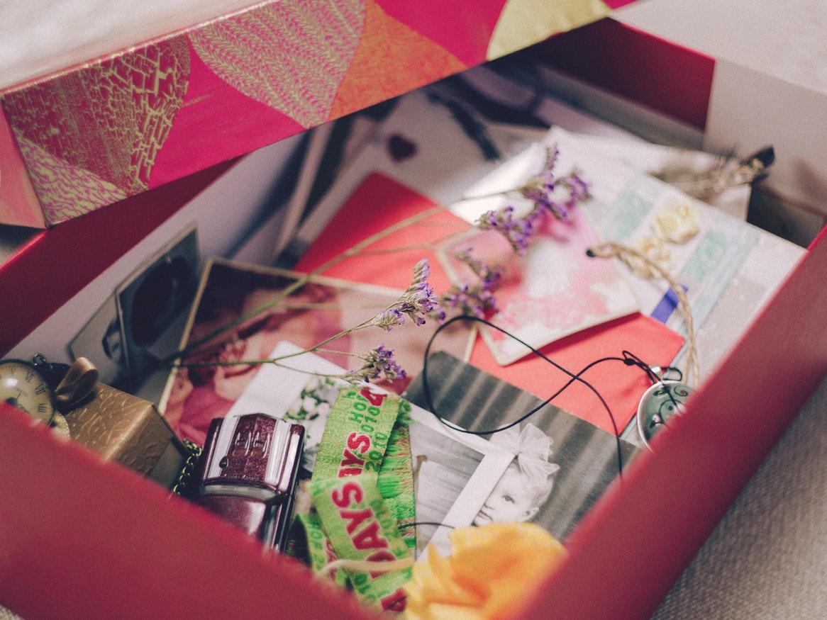 Pink box full of personal mementos