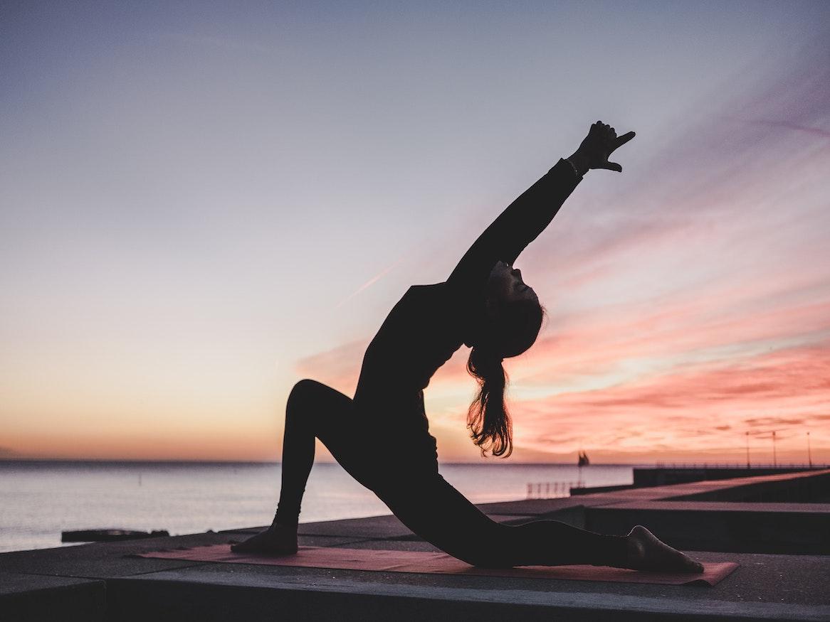Woman doing a yoga pose.