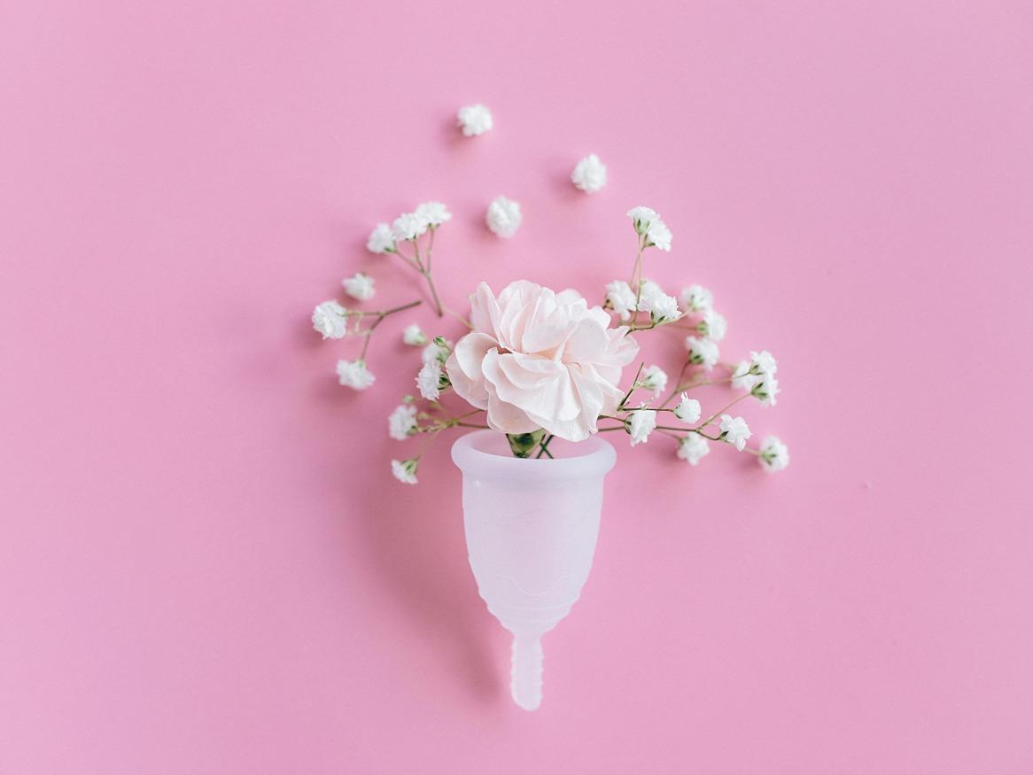 Menstrual cup decorated with flowers